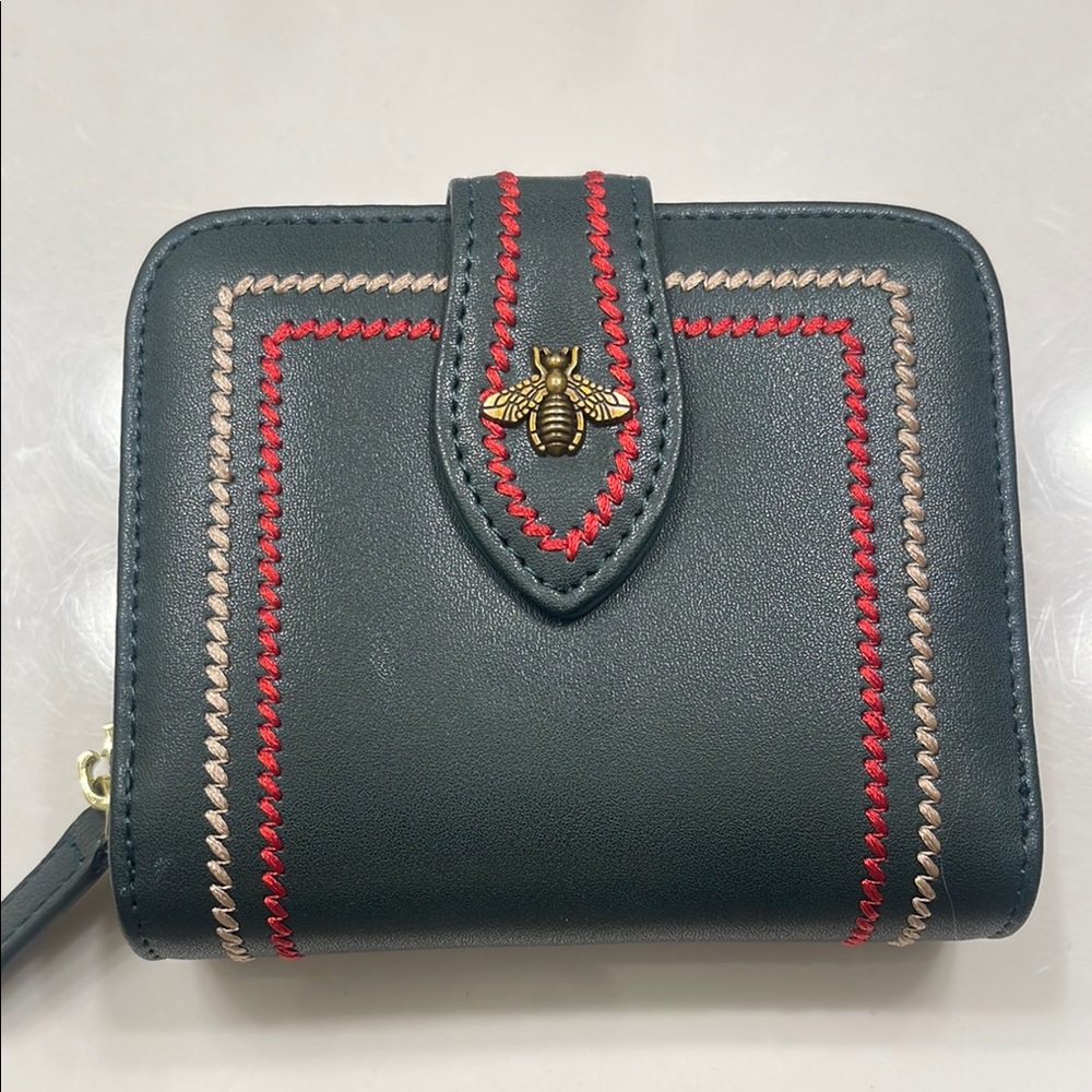 Compact Green and Red Wallet with Unique Flap Closure 13 credit cards space